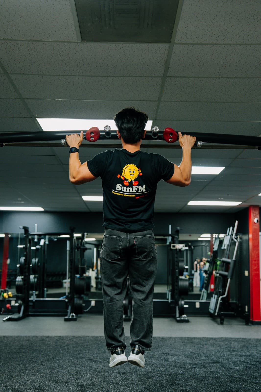 Pull-up rig on the training floor at the SunFM studio in San Jose