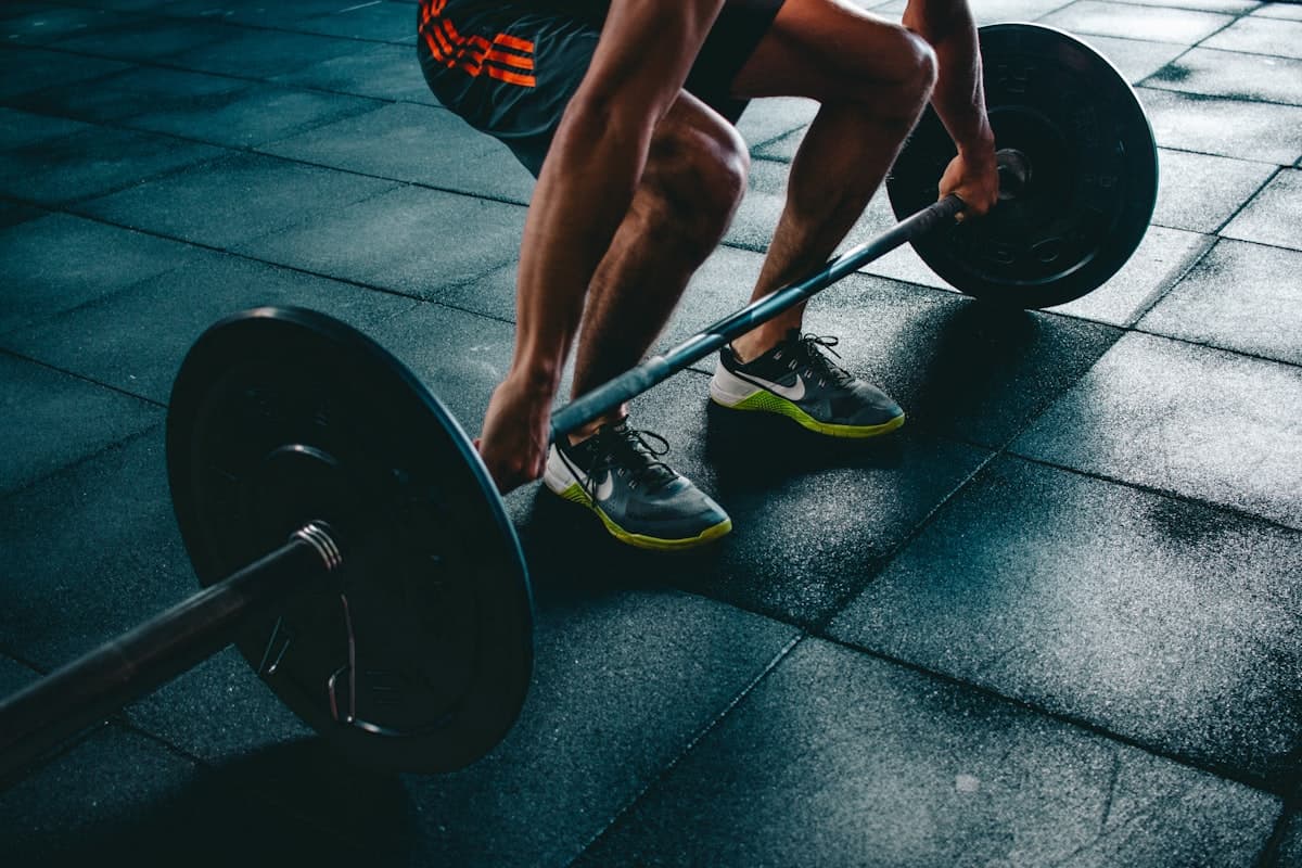 Strength training with dumbbells in the gym